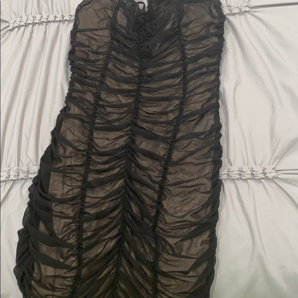 Black and nude ruffed bodycon dress